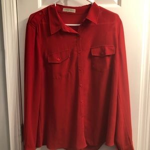 Red silky blouse